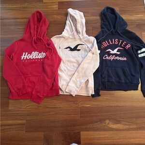 Hollister Hoodies (3) in Red, Pink, and Blue
